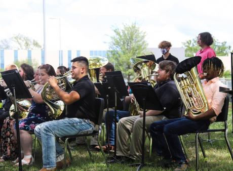 students playing instruments at concert