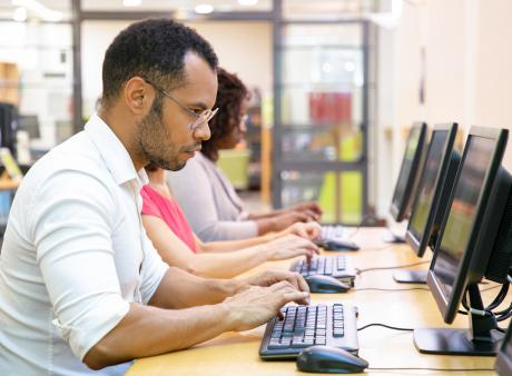 male student at computer