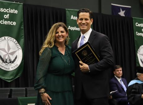 Oneal and Brandenburg pose with plaque