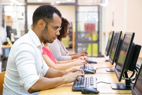 male student at computer