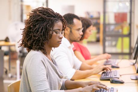 Students in front of computers testing